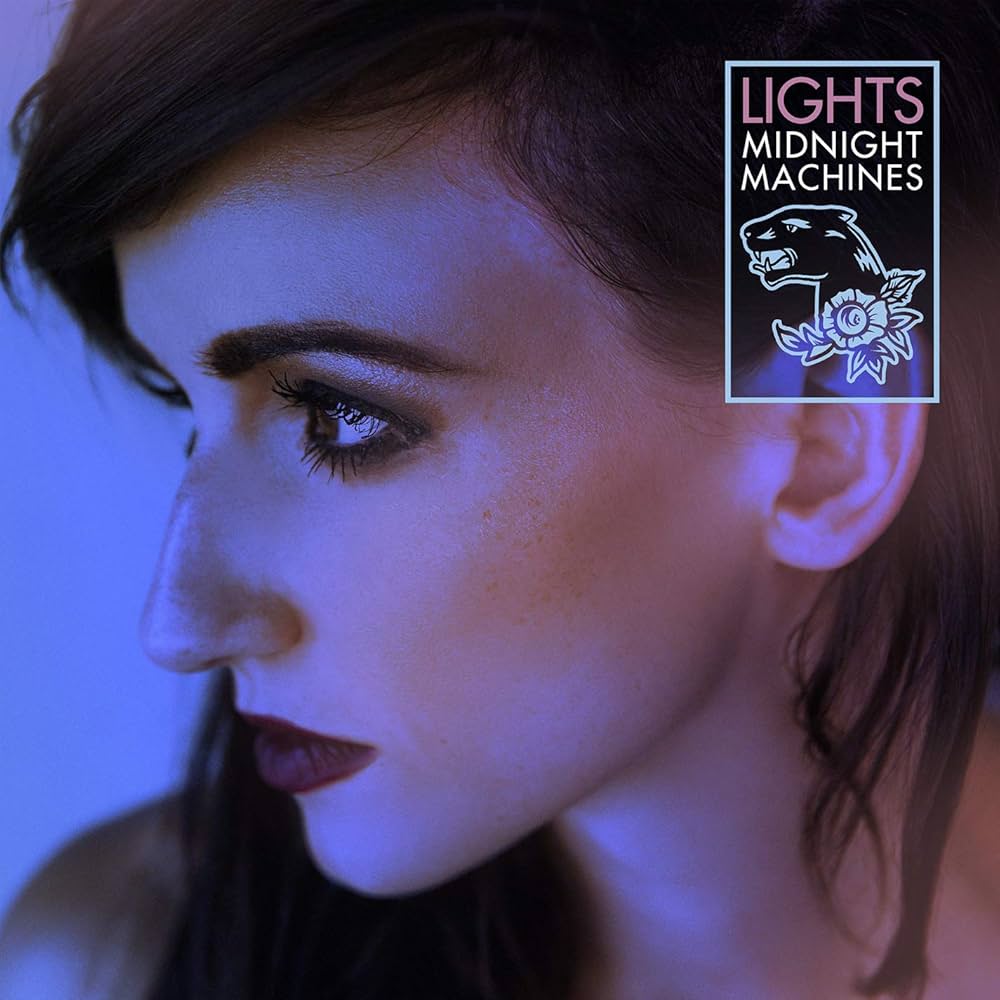 The album cover for Lights' Midnight Machines, a shot of her face in profile, lit with blue-toned lights.