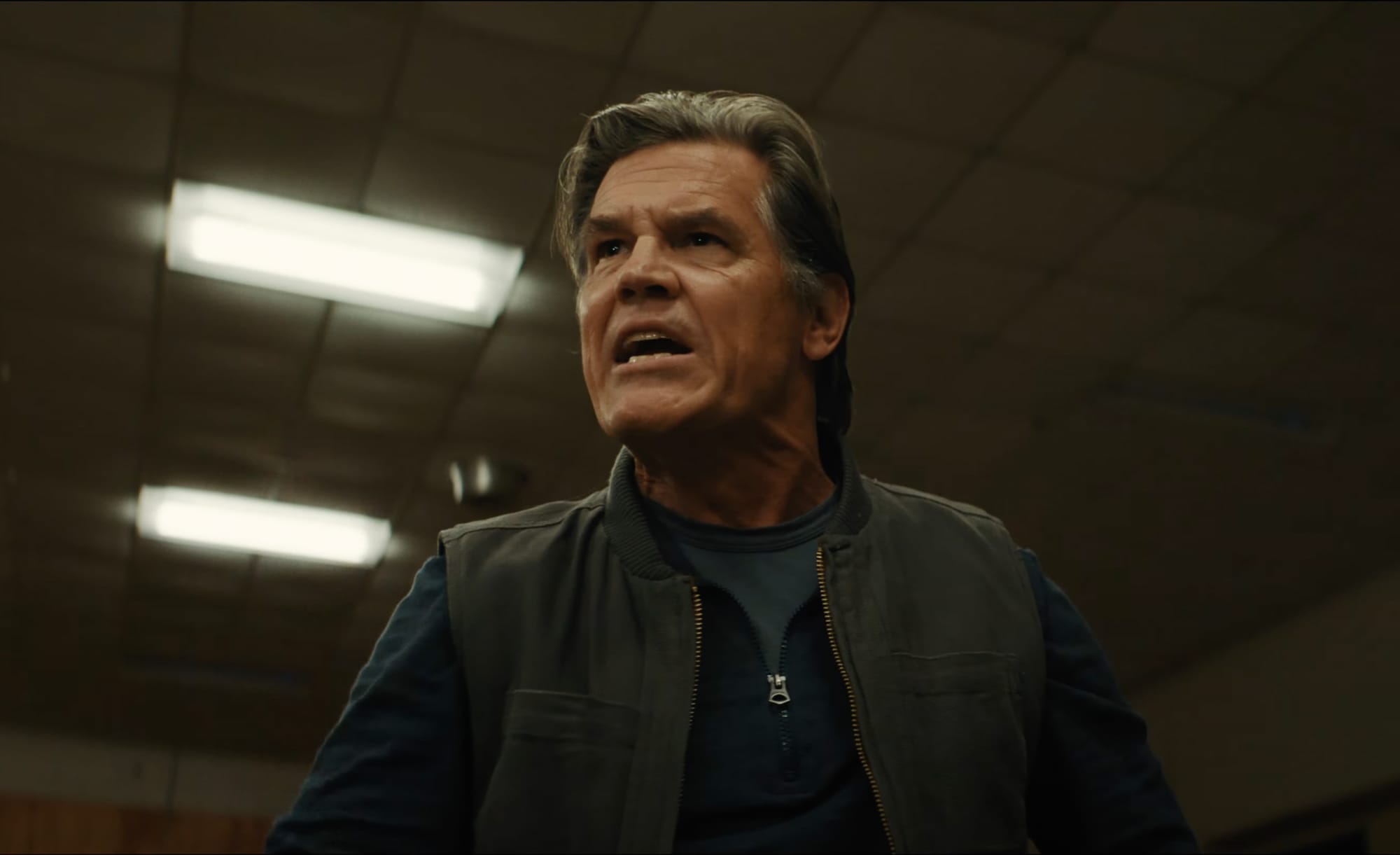 Josh Brolin, shot from below, as he shouts at someone offscreen.